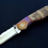 F38 - Titanium and Coral - $750.00